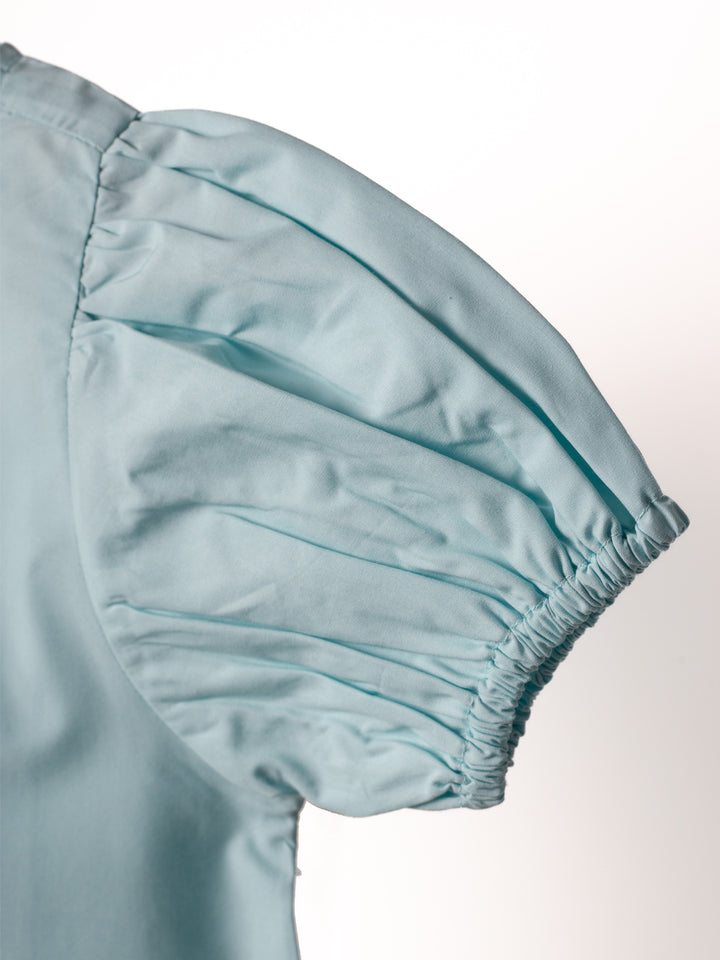 Blue dress for girls. Close up