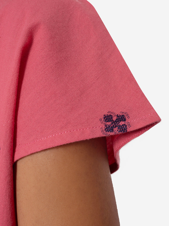 Pink shorts set, close up